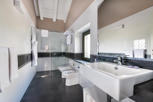 Imagen de la habitación del Firriato Hospitality Cavanera Etnea Resort & Wine. Foto 9