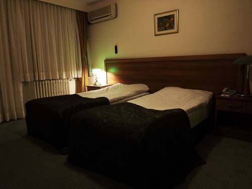 Imagen de la habitación del First Apart Hotel. Foto 6