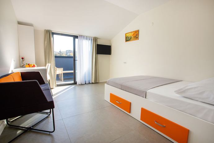 Imagen de la habitación del First Joy Hotel. Foto 12
