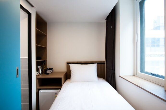 Imagen de la habitación del First Stay Hotel Tawny Owl. Foto 7