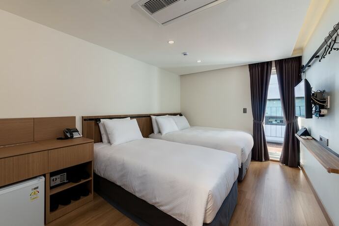 Imagen de la habitación del First Stay Hotel Tawny Owl. Foto 9