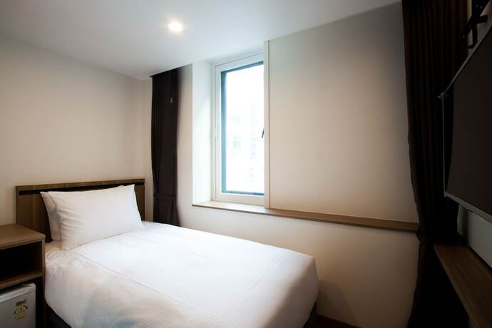 Imagen de la habitación del First Stay Hotel Tawny Owl. Foto 10