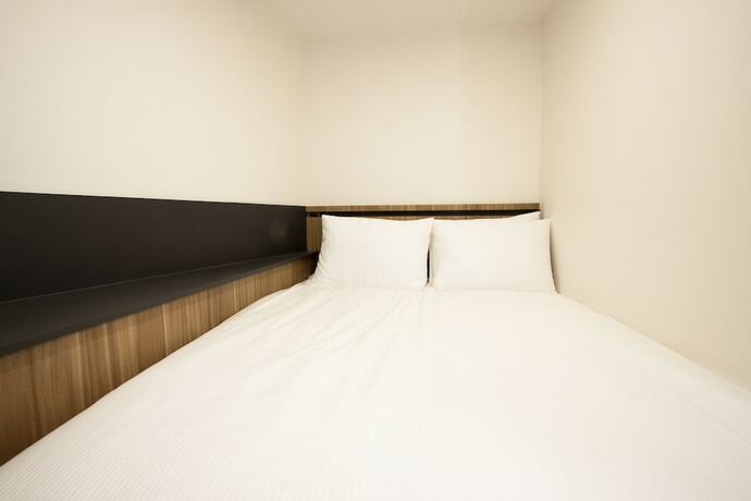 Imagen de la habitación del First Stay Hotel Tawny Owl. Foto 15