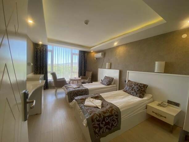 Imagen de la habitación del Firuze Beyaz Saray Otel. Foto 13