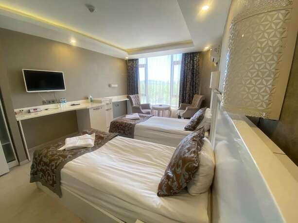 Imagen de la habitación del Firuze Beyaz Saray Otel. Foto 15