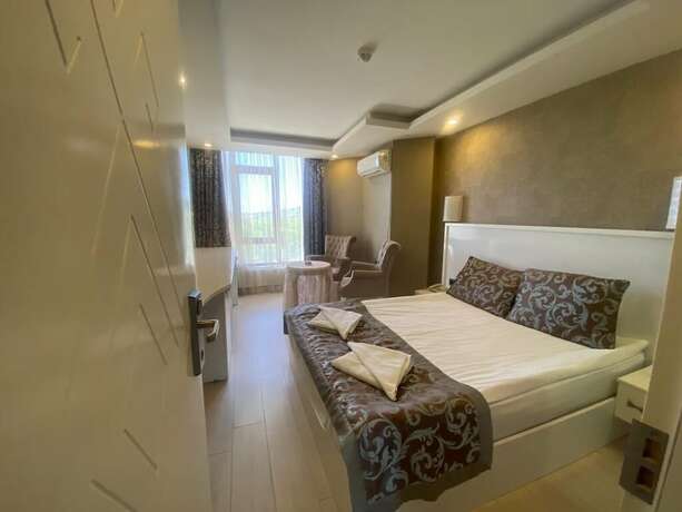 Imagen de la habitación del Firuze Beyaz Saray Otel. Foto 16