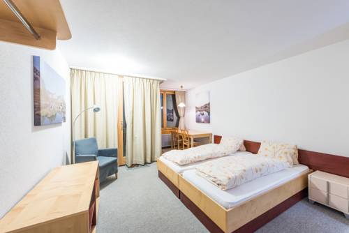 Imagen de la habitación del Fischers Alpenhotel. Foto 9