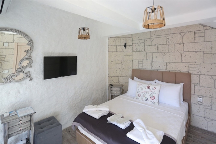 Imagen de la habitación del Fizzio Alacati Hotel. Foto 1