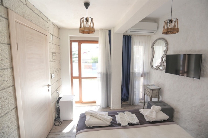 Imagen de la habitación del Fizzio Alacati Hotel. Foto 2