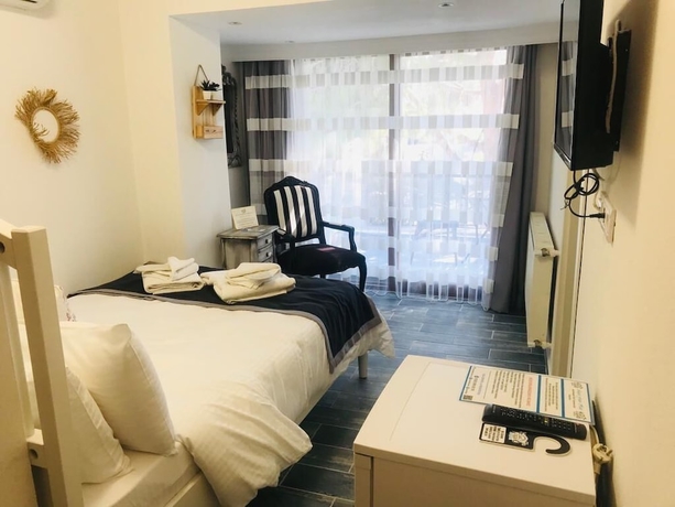 Imagen de la habitación del Fizzio Alacati Hotel. Foto 4