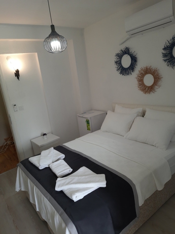 Imagen de la habitación del Fizzio Alacati Hotel. Foto 17