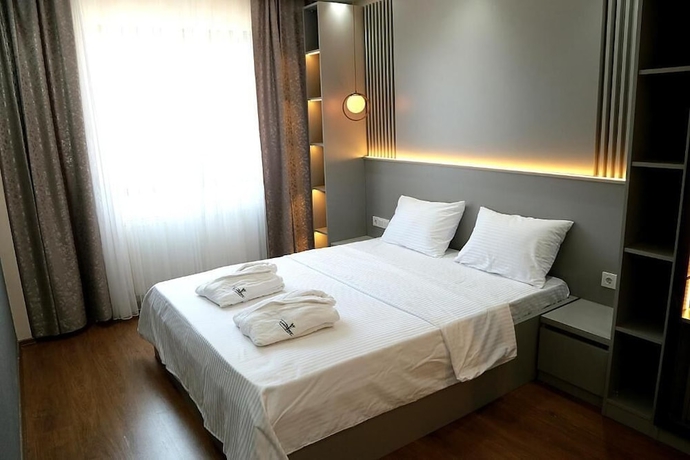 Imagen de la habitación del Flower City Suits. Foto 2