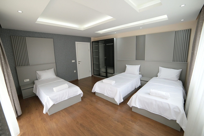 Imagen de la habitación del Flower City Suits. Foto 4