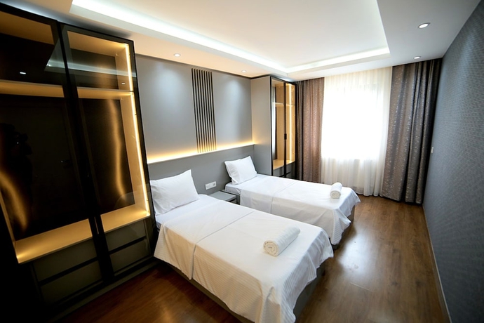 Imagen de la habitación del Flower City Suits. Foto 6