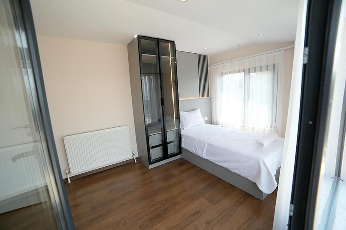 Imagen de la habitación del Flower City Suits. Foto 7