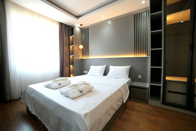 Imagen de la habitación del Flower City Suits. Foto 8