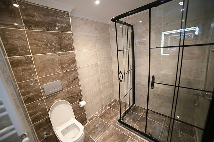 Imagen de la habitación del Flower City Suits. Foto 14