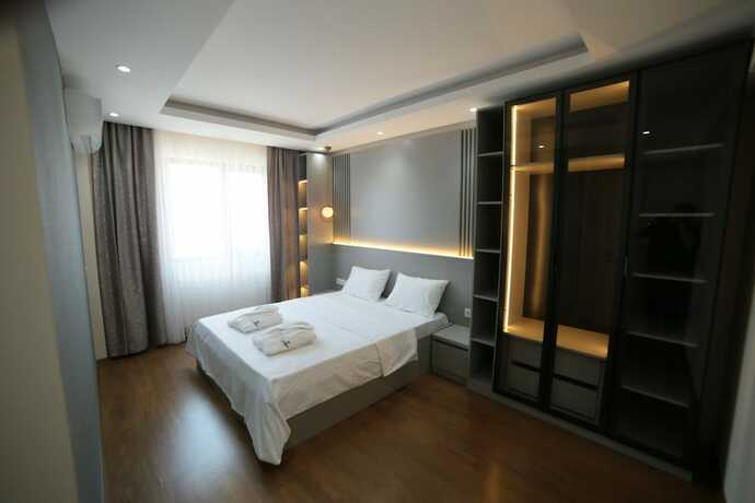 Imagen de la habitación del Flower City Suits, Koru. Foto 17