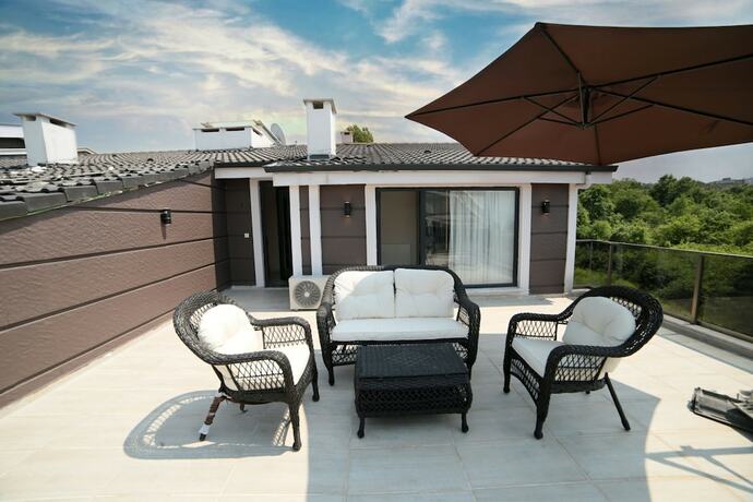 Imagen de la habitación del Flower City Suits, Koru. Foto 20