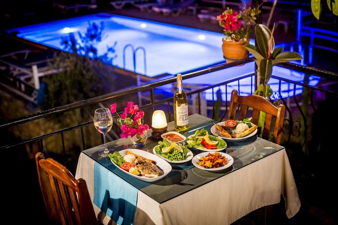 Imagen del bar/restaurante del Flower Pension Hotel. Foto 5