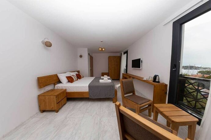 Imagen de la habitación del Foca Kybele Hotel. Foto 16