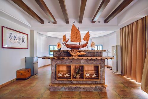 Imagen general del Forest Inn Ri Yue Bay Surf Branch. Foto 4