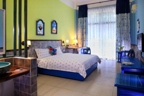 Imagen general del Forest Inn Ri Yue Bay Surf Branch. Foto 7