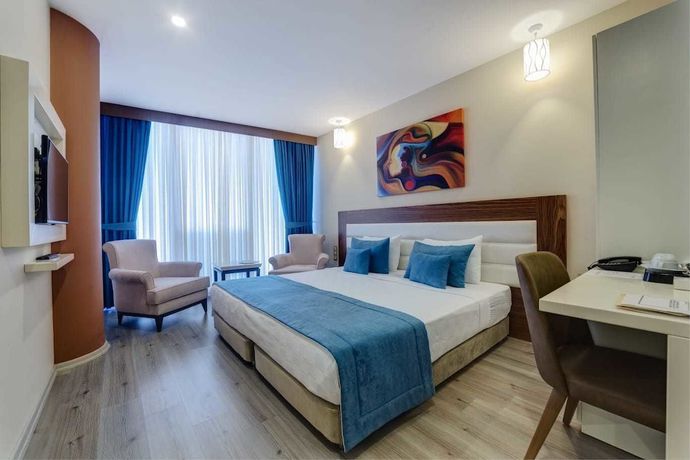 Imagen de la habitación del Forum Suite Hotel. Foto 8