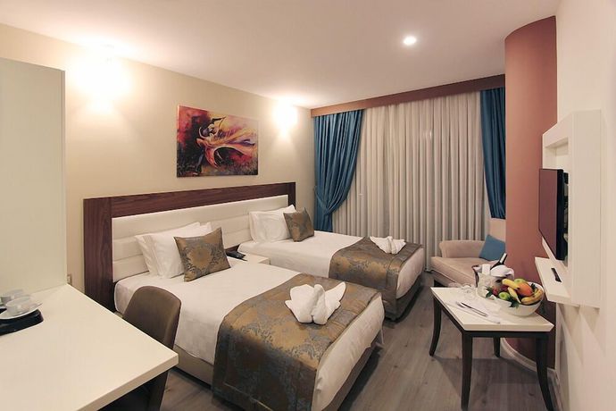Imagen de la habitación del Forum Suite Hotel. Foto 10