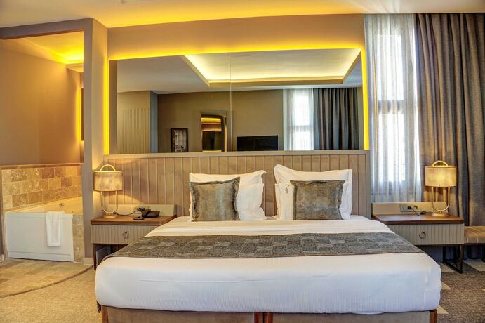 Imagen de la habitación del Four Mansions Hotel. Foto 11