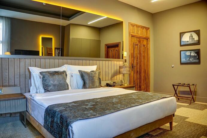 Imagen de la habitación del Four Mansions Hotel. Foto 12