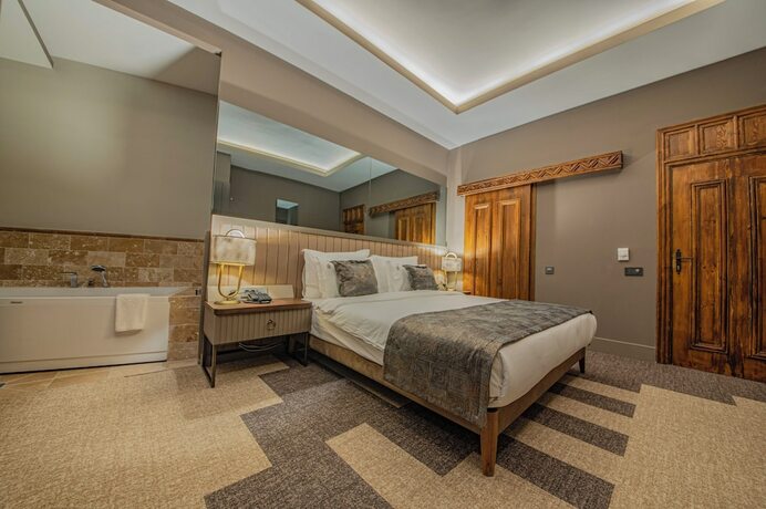 Imagen de la habitación del Four Mansions Hotel. Foto 14