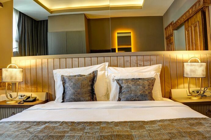 Imagen de la habitación del Four Mansions Hotel. Foto 15
