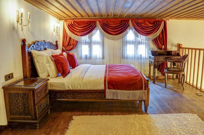 Imagen de la habitación del Four Mansions Hotel. Foto 16