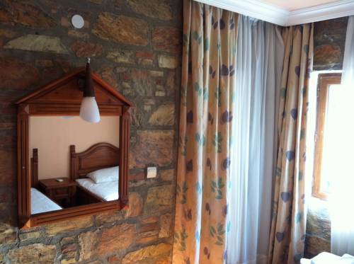 Imagen de la habitación del Four Seas Apart Hotel. Foto 1