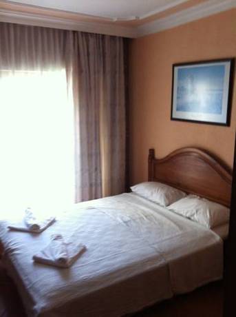 Imagen de la habitación del Four Seas Apart Hotel. Foto 2