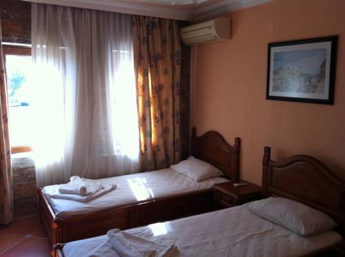Imagen de la habitación del Four Seas Apart Hotel. Foto 6