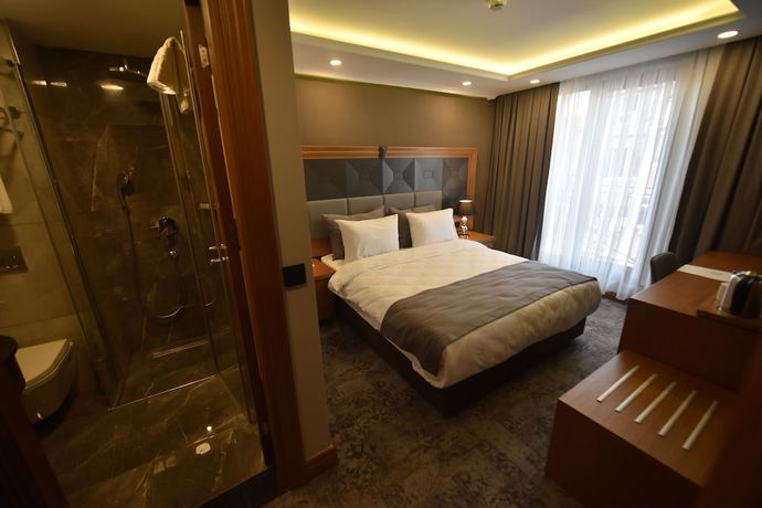 Imagen de la habitación del Four Seven Hotel. Foto 16