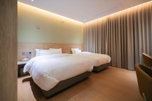 Imagen de la habitación del From H Heritage Hotel. Foto 17