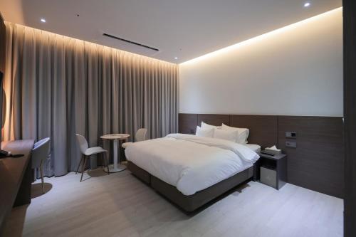 Imagen de la habitación del From H Heritage Hotel. Foto 18