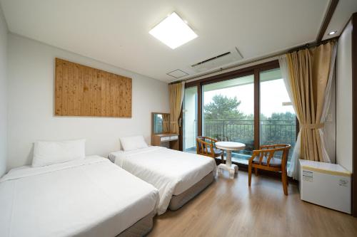 Imagen de la habitación del FromH T Resort Jeju Seongsan. Foto 18