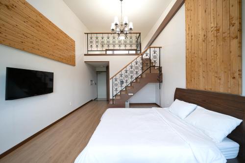 Imagen de la habitación del FromH T Resort Jeju Seongsan. Foto 19