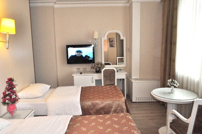 Imagen de la habitación del Fuar Hotel. Foto 11