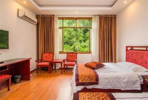 Imagen de la habitación del Fuhu Temple Qiaotou Hotel. Foto 7