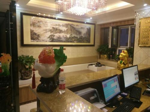 Imagen de la habitación del Fuxiang Business Inn. Foto 4