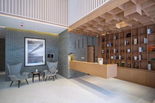 Imagen de la habitación del Fuyinqingshe Hotel. Foto 10