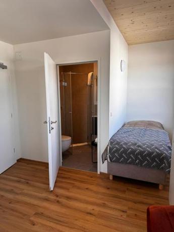 Imagen de la habitación del GLOCKNERALM - HIKING- and SKIHOTEL exklusively accessible by cable car. Foto 19