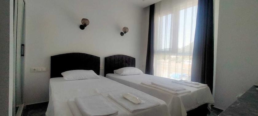 Imagen de la habitación del GRAND K&Ouml;SE AİRPORT HOTEL, Ortaca. Foto 5