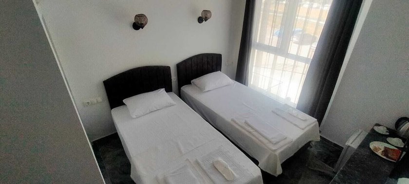 Imagen de la habitación del GRAND K&Ouml;SE AİRPORT HOTEL, Ortaca. Foto 8