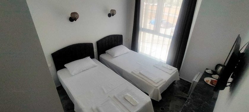Imagen de la habitación del GRAND K&Ouml;SE AİRPORT HOTEL, Ortaca. Foto 12
